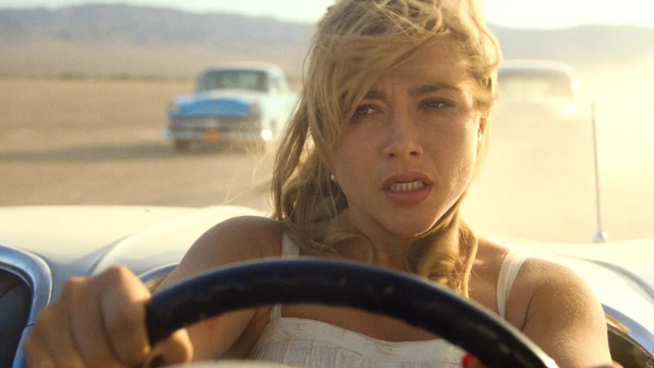 florence pugh driving a convertible in a car chase scene in the movie don&#039;t worry darling