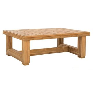 A light brown wide-legged outdoor coffee table for w&h's best outdoor furniture brands.