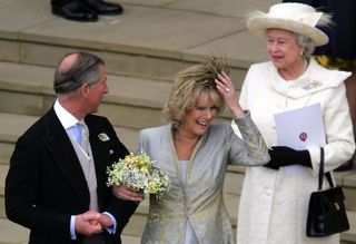 Queen Elizabeth walking behind Charles and Camilla on their wedding day