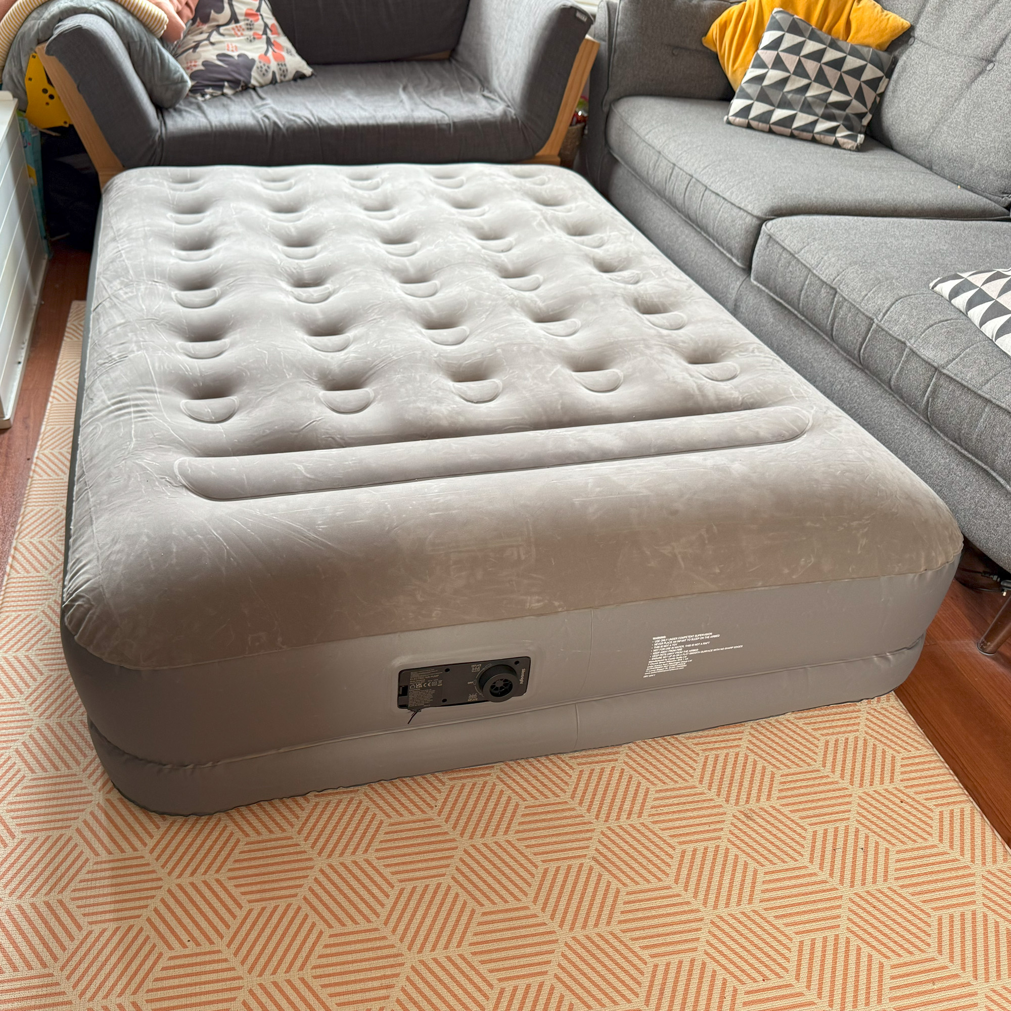The Silentnight Extra High Flocked Airbed being tested