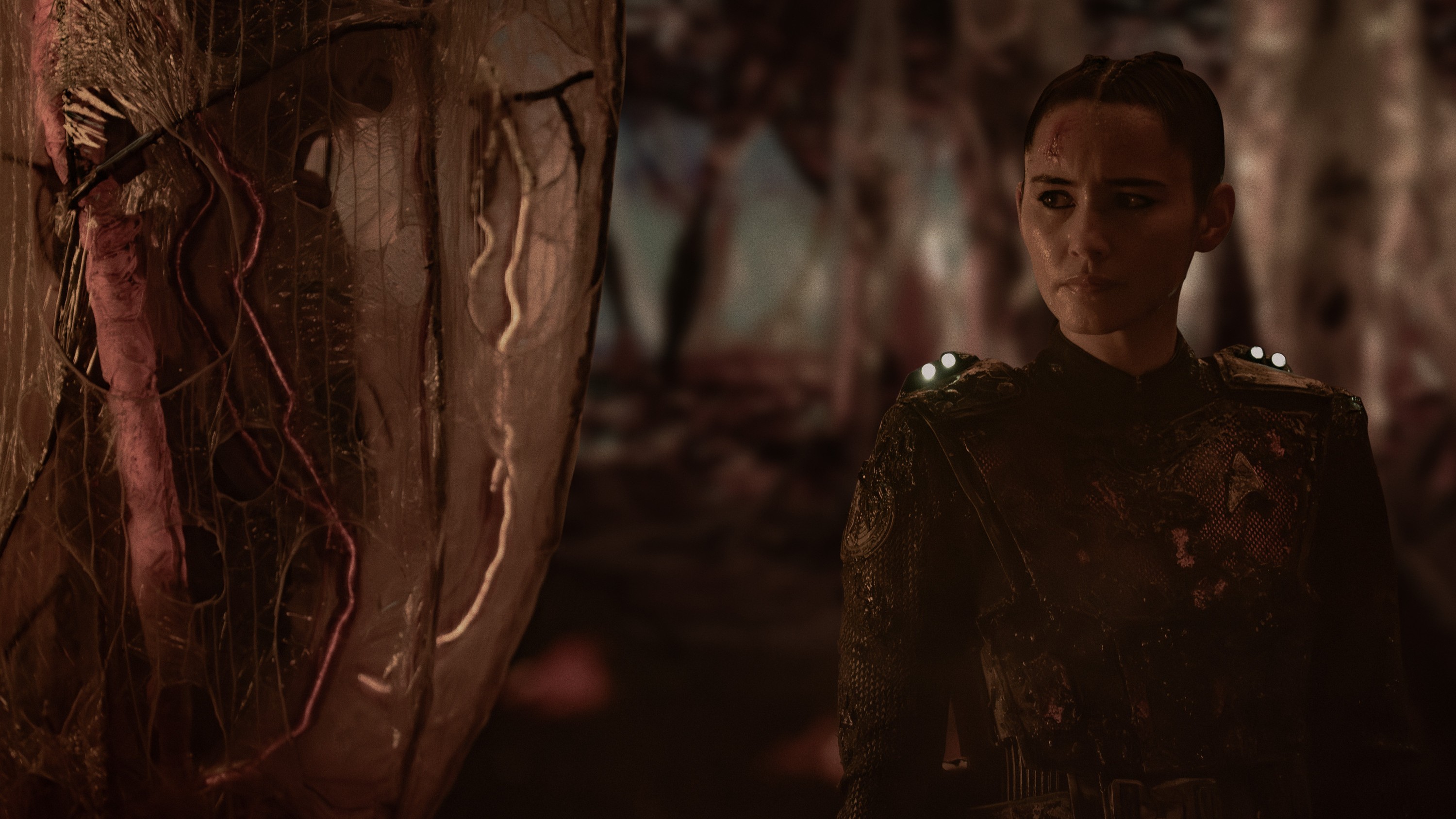 Christina Chong as Laían standing in the Gorn ship in Star Trek: Strange New Worlds season 3