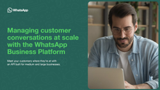 Whitepaper cover with title on green banner and image of man working on a laptop on the right