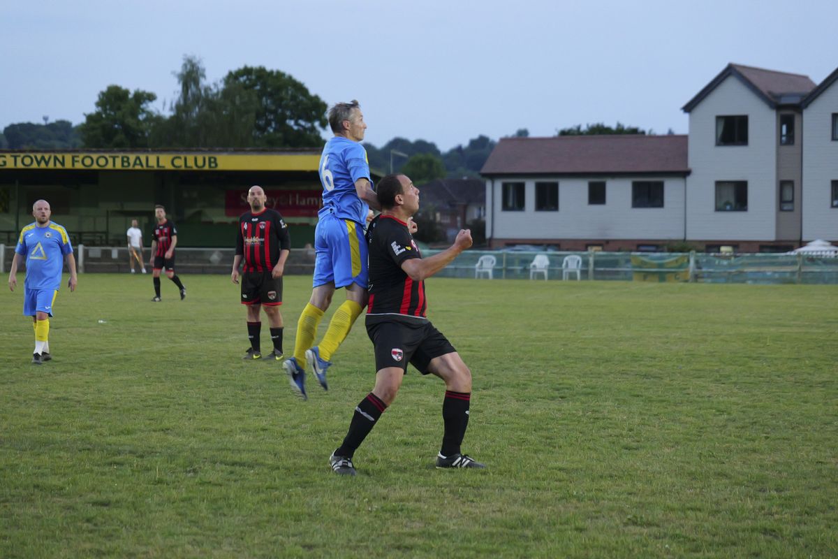 Panasonic Lumix S1 II sample gallery: footballers in action during game at last light