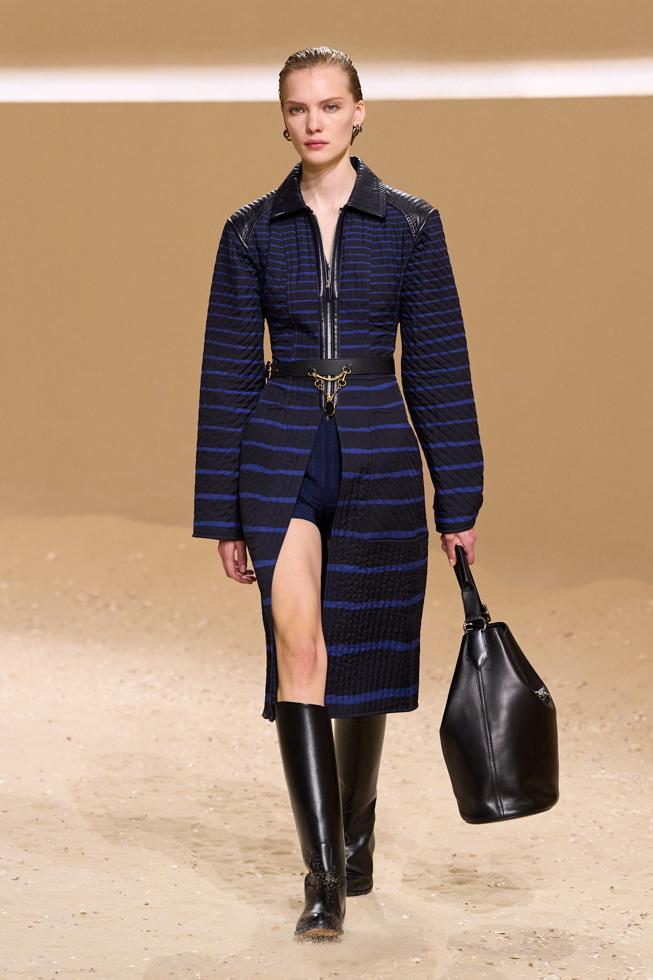 A model walks the Herm&amp;egrave;s spring 2026 runway show in paris.