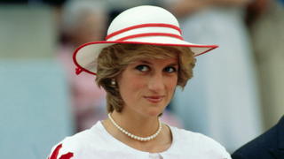 Diana, Princess of Wales, wears an outfit in the colors of Canada during a state visit to Edmonton, Alberta, with her husband in 1983