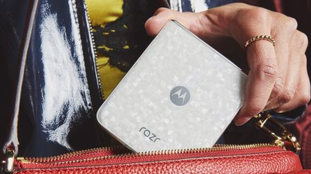 The Motorola Razr 2026 in a red purse