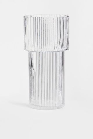 A ribbed glass vase