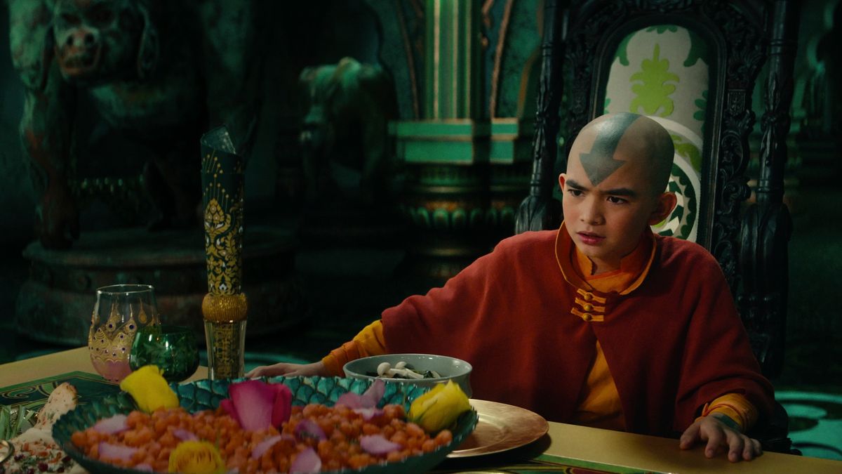 Aang (Gordon Cormier) sitting at a feast table in Avatar: The Last Airbender episode 4