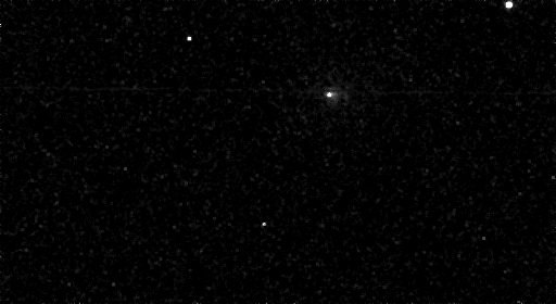 a low-resolution animation of a comet passing through a dark starry sky