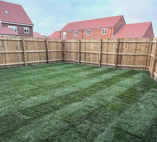 product images of freshly rolled truf in a small garden Inturf Classic Turf Roll 20sqm