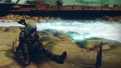 A Guardian sat on the shore by bright blue water in Destiny