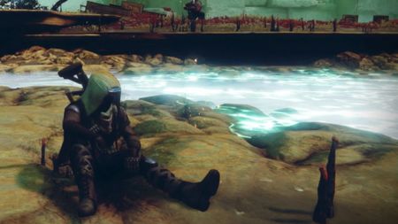 A Guardian sat on the shore by bright blue water in Destiny