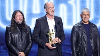Nirvana on stage with their MTV award