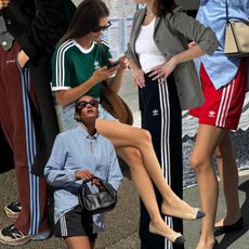 fashion collage featuring four style influencers wearing adidas striped pieces like track pants, track shorts, and t-shirts