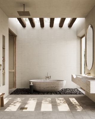 Warm white bathroom with freestanding stone bathtub