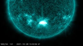 An X1-class solar flare erupts from an Earth-facing sunspot on the sun on Oct. 28, 2021 in this image from NASA's Solar Dynamics Observatory.