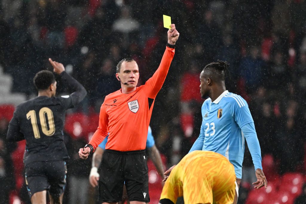 Michy Batshuayi of Belgium receives a yellow card from referee Sebastian Gishamer during a friendly football game between the national teams of England and Belgium in preparation on the UEFA Euro 2024 tournament, on March 26, 2024 in Wembley Stadium, London, England, United Kingdom. (Photo by Isosport/MB Media/Getty Images)