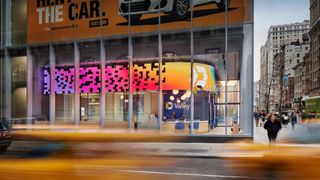 A curved dvLED screen powered by PixelFLEX shines bright on Fifth Ave. in NYC in Valley Bank.