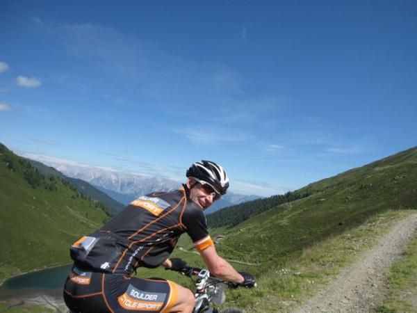 Pete climbs to the Sound of Music. Notice the valley below. That is where we started.