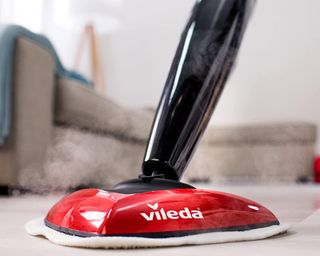 Image of Vileda Steam Mop in lifestyle image beiing used on hard floors