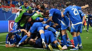 Mattia Zaccagni celebrates with his Italy team-mates after his late equaliser against Croatia at Euro 2024.
