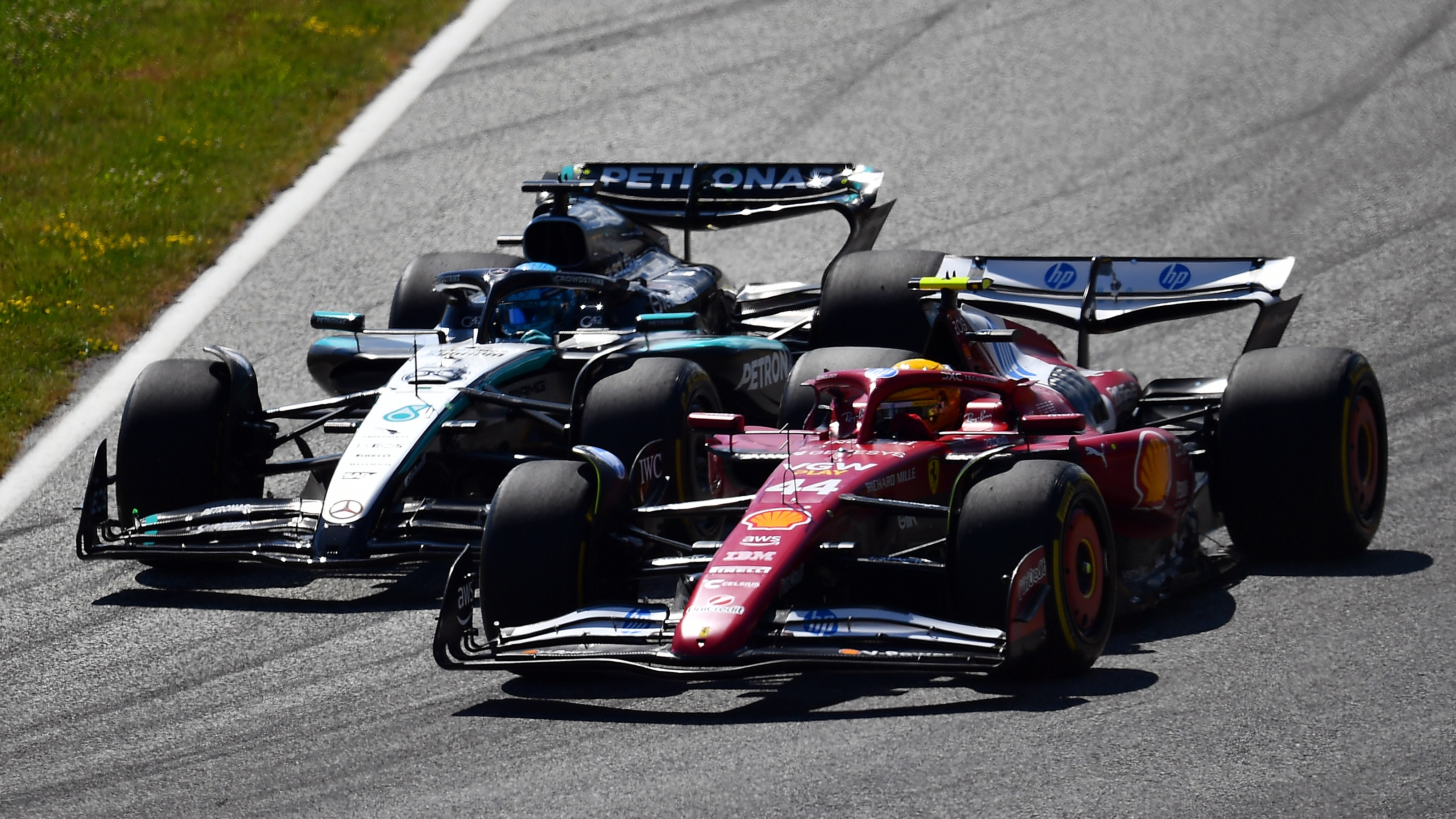 Lewis Hamilton and George Russell go head-to-head at the Austrian GP.