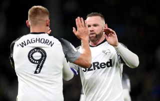 Martyn Waghorn (left) celebrates his goal with Wayne Rooney