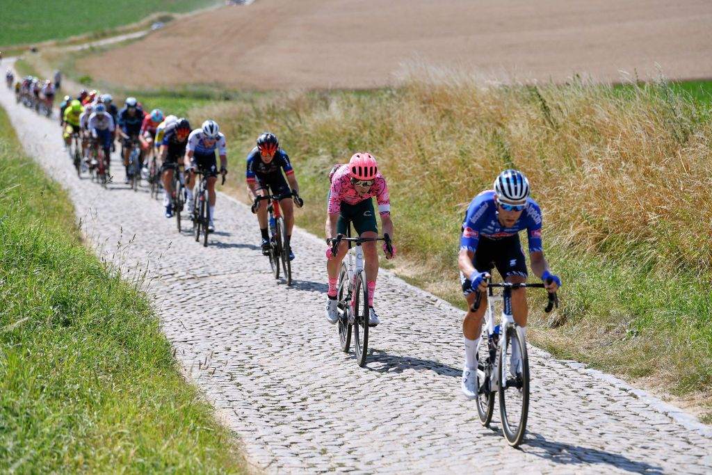 CHAPELLELEZHERLAIMONT BELGIUM JULY 27 Jens Keukeleire of Belgium and Team EF Education Easypost competes passing through a cobblestones sector during the 43rd Ethias Tour de Wallonie 2022 Stage 5 a 2148km stage from Le Roeulx to ChapellelezHerlaimont ethiastourdewallonie22 on July 27 2022 in ChapellelezHerlaimont Belgium Photo by Luc ClaessenGetty Images