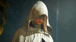 A cloaked Elden Ring Nightreign character looking downward in a dark room