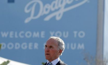 Los Angeles Dodgers owner Frank McCourt is trying to hang onto his baseball team by filing for bankruptcy.