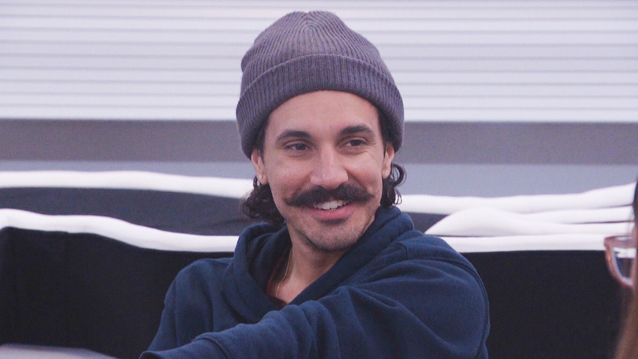 Vince smiling while talking to Kelley