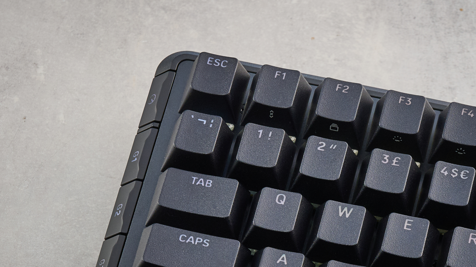 The Corsair Vanguard Pro 96 in black, on a stone surface