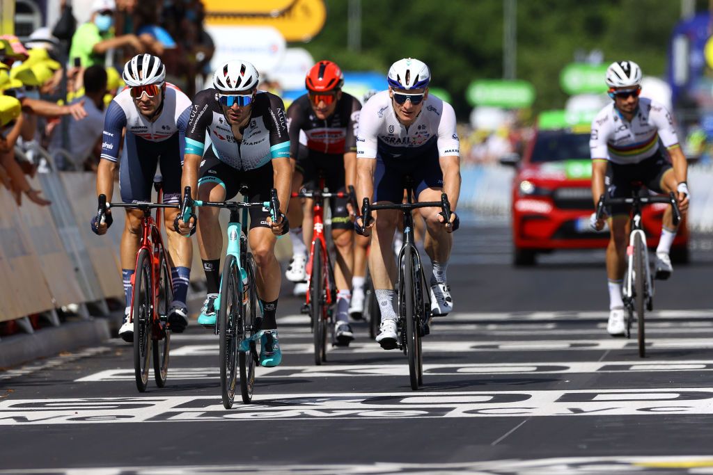 NMES FRANCE JULY 08 Edward Theuns of Belgium and Team Trek Segafredo Luka Mezgec of Slovenia and Team BikeExchange Andr Greipel of Germany and Team Israel StartUp Nation at arrival during the 108th Tour de France 2021 Stage 12 a 1594km stage from SaintPaulTroisChateaux to Nimes LeTour TDF2021 on July 08 2021 in Nmes France Photo by Tim de WaeleGetty Images