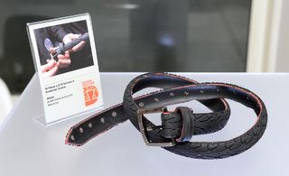 A photo of a brown belt made from recycled bike tyres.