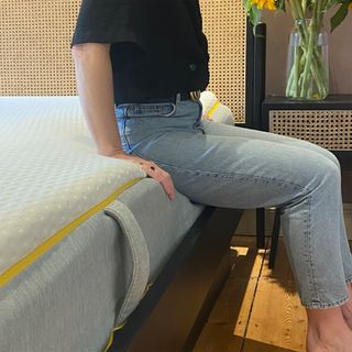 The Eve Wunderflip Lighter Hybrid mattress being tested