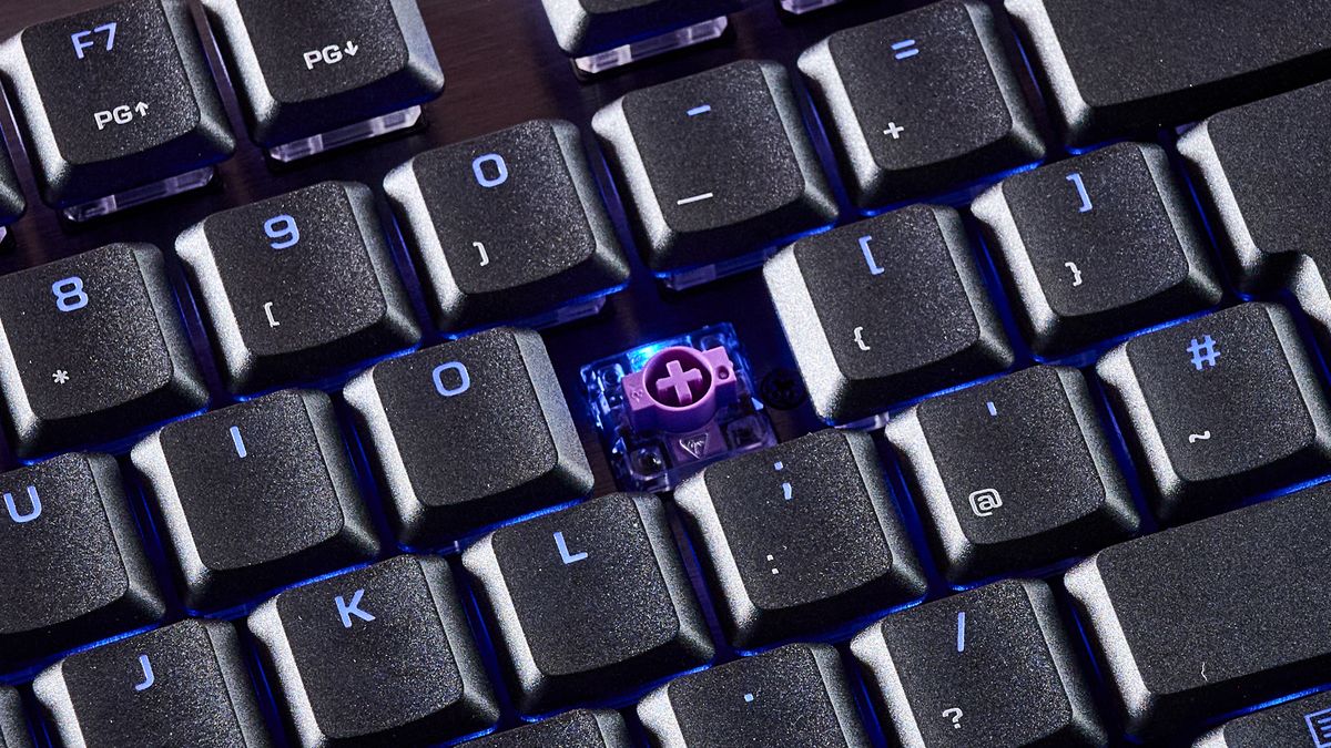 A closeup of the Turtle Beach Command Series KB7's keys with the P keycap removed.