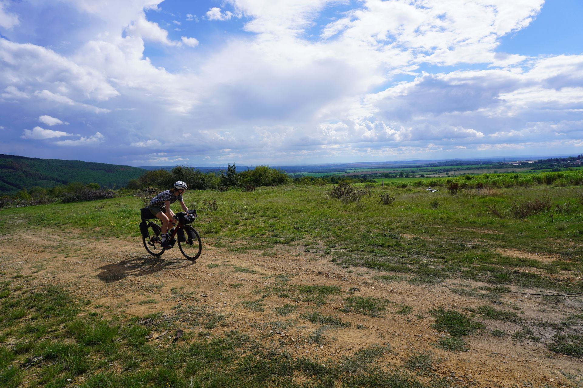 Image shows Anna cycling wearing the Crankbrother Stamp Lace flat shoes.