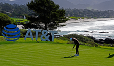 Akshay Bhatia hits a putt at Pebble Beach