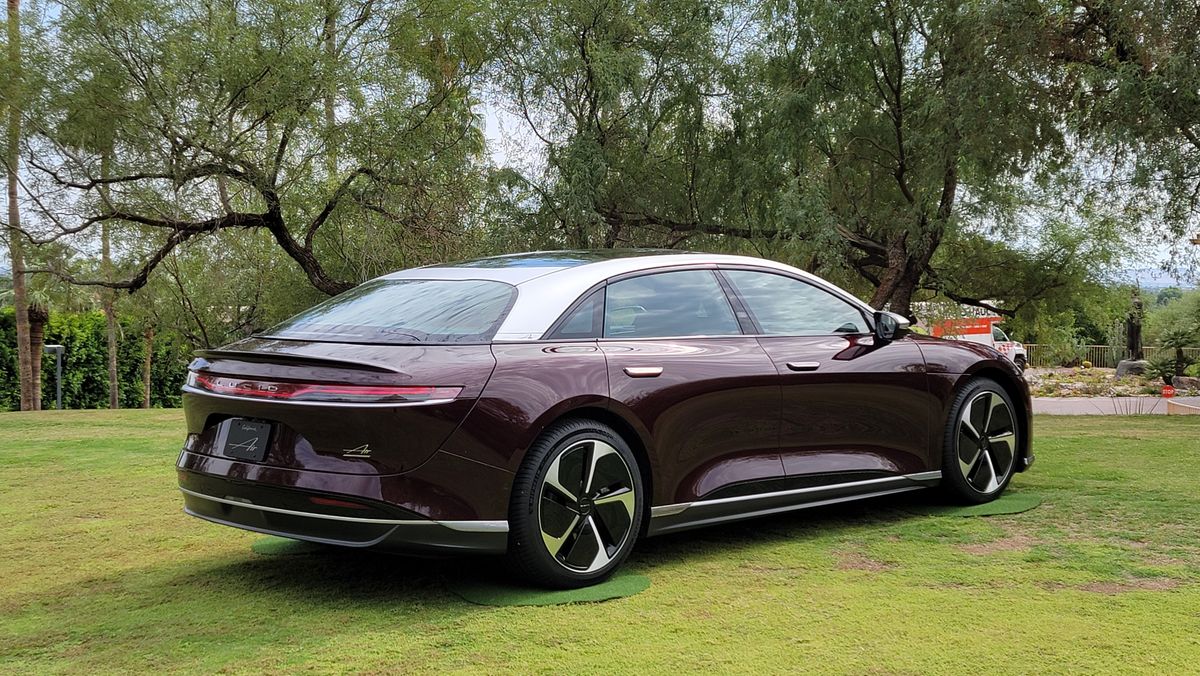 Angled side view of car parked on grass