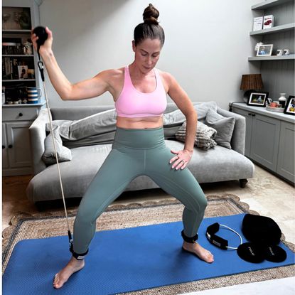 Health writer Anna Bartter trying the new Sculpt Anywhere by Pvolve at home workout kit