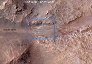 a satellite view of a reddish-brown landscape