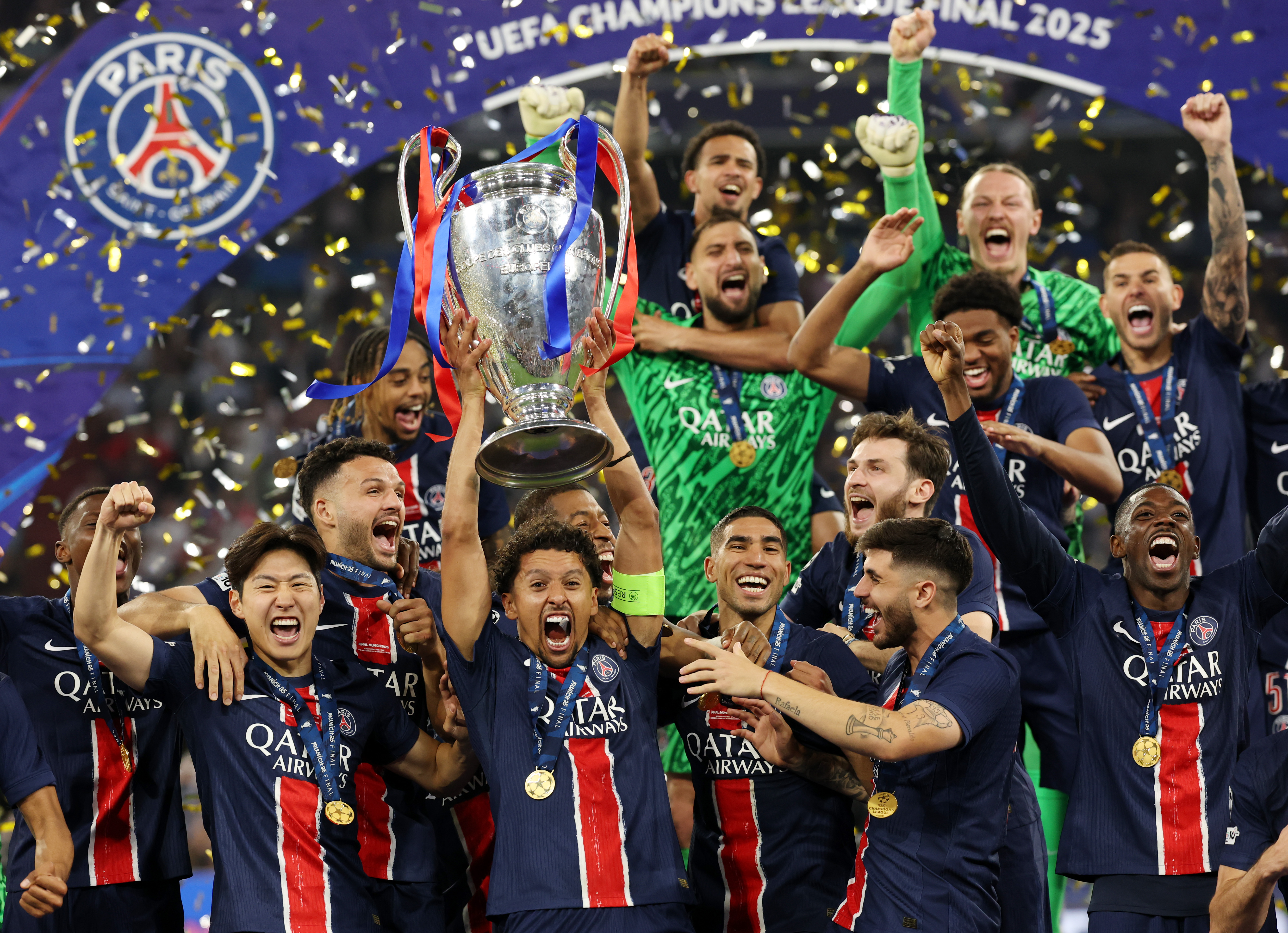 PSG captain Marquinhos hoists the Champions League trophy aloft