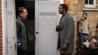 Cyril (Zephryhn Taitte) speak to Norman Clint (Neil Bromley)