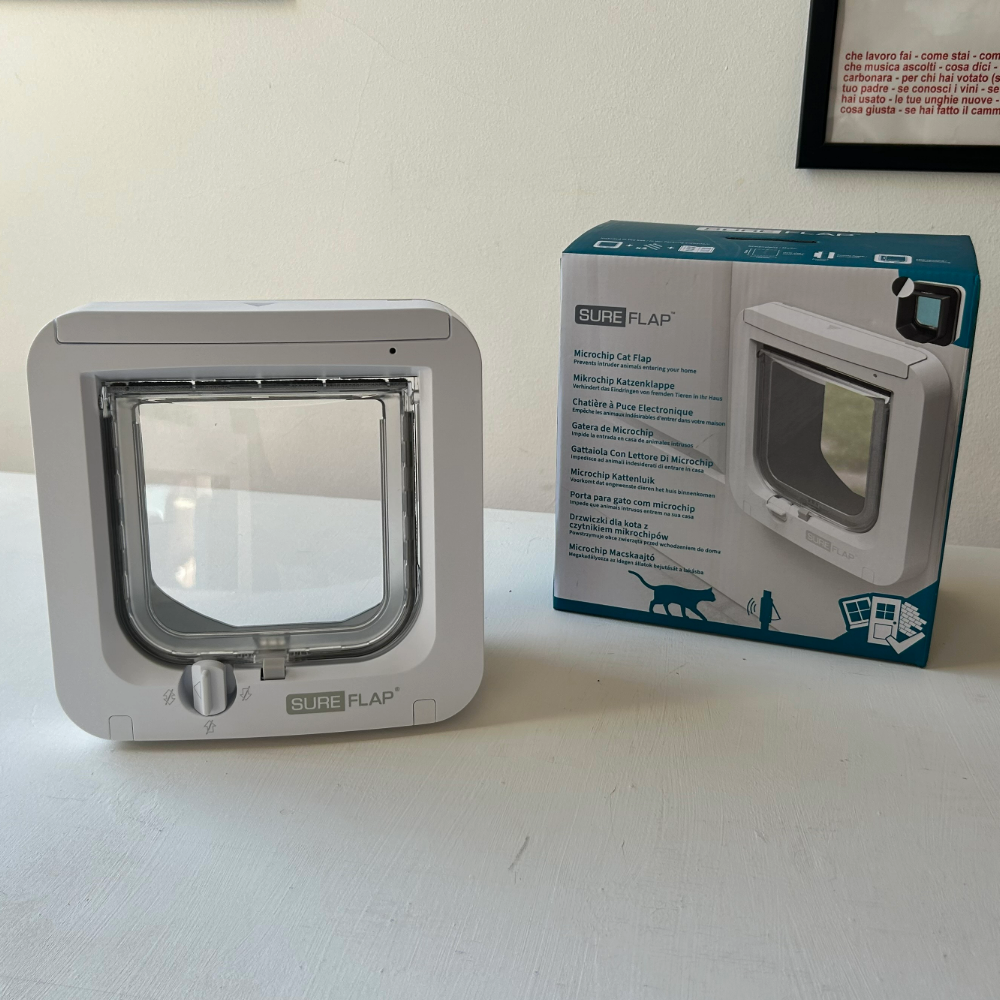 SureFlap Microchip Cat Flap, one of the best microchip cat flaps, on Megan's table