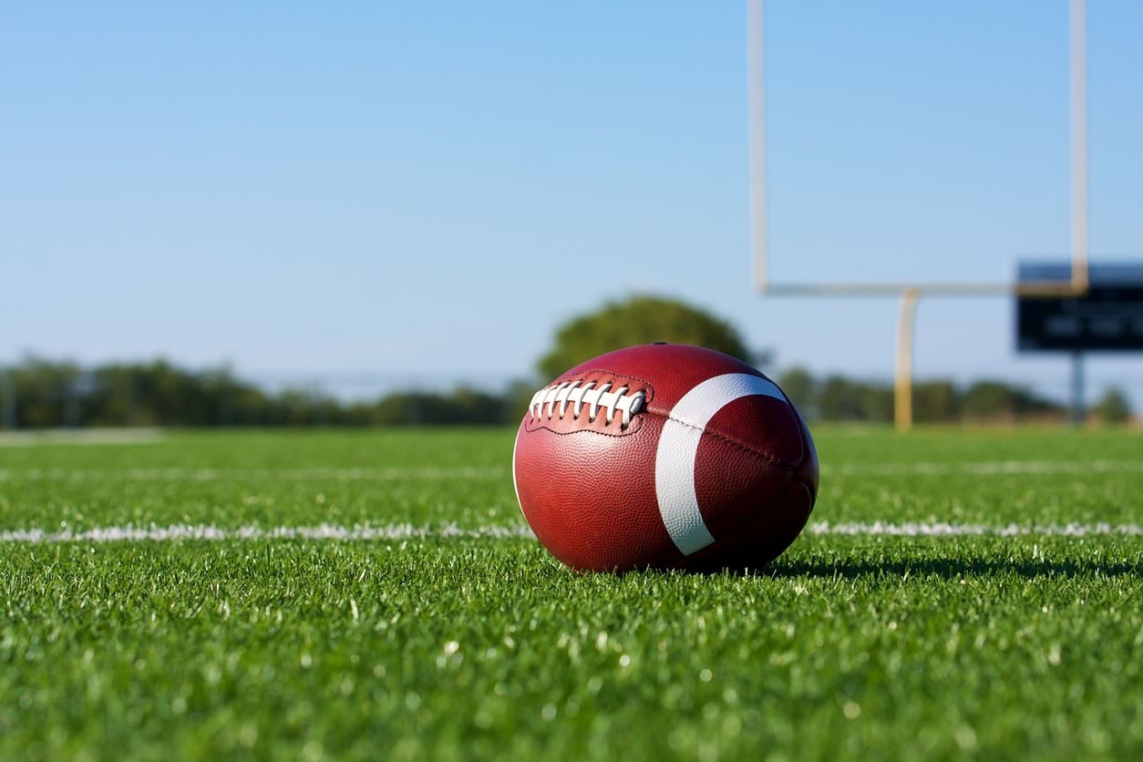 A football on the field.