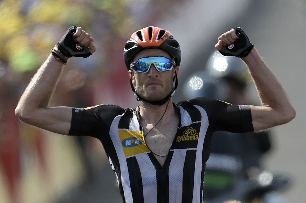 Steven Cummings of African team MTN-Qhubeka wins stage 14 of the Tour de France on Nelson Mandela day.