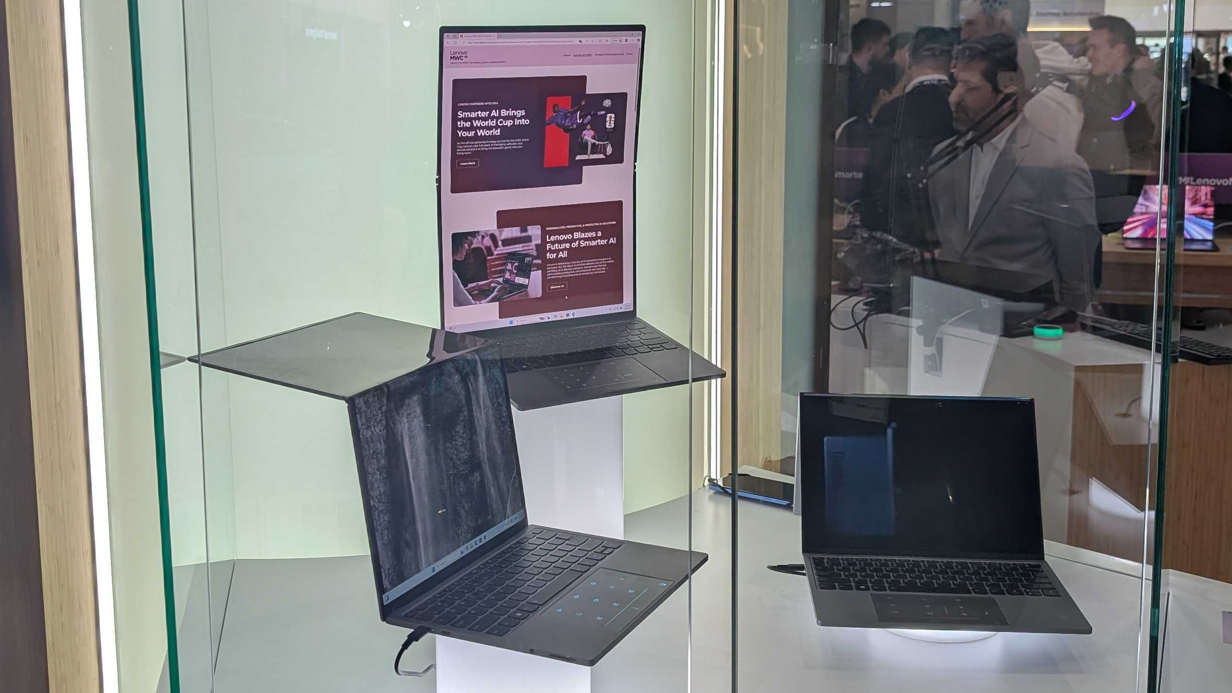 Lenovo's Codename Flip laptop, showing the screen in three different states of being folded, going from a regular laptop to a weirdly tall laptop