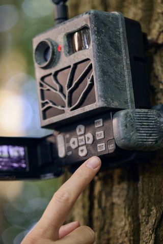 a close up of the Zeiss Secacam 3 outdoors on a tree showing the display and button interface