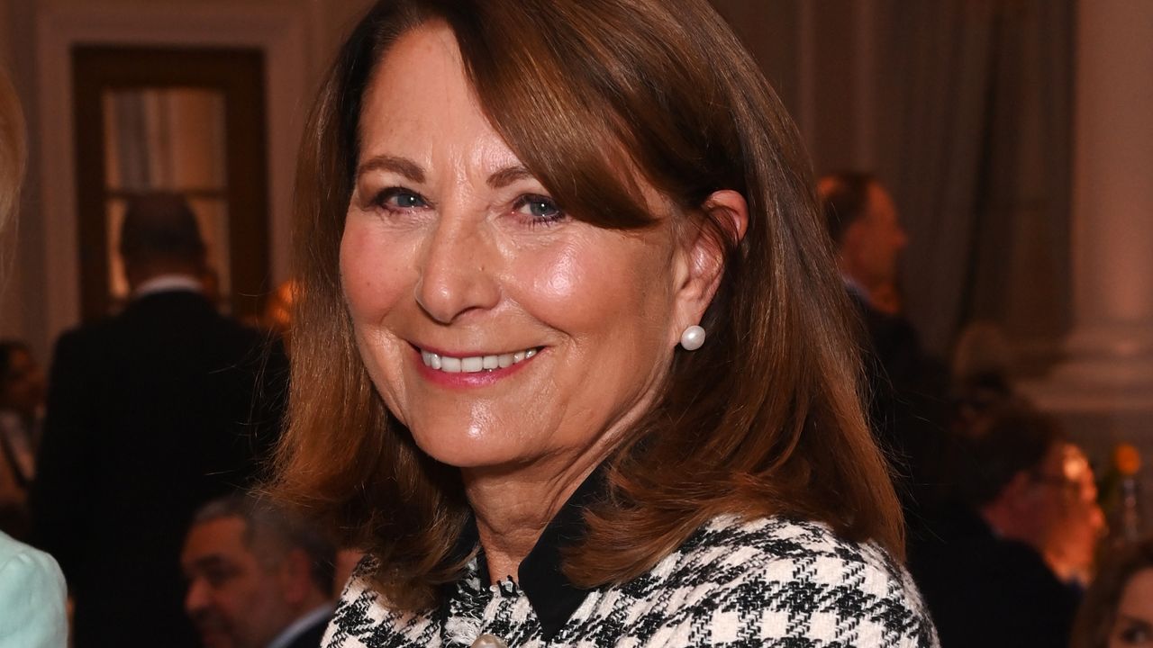 Carole Middleton, wearing a gingham jacket, attends Turn The Tables 2025 in aid of Cancer Research UK