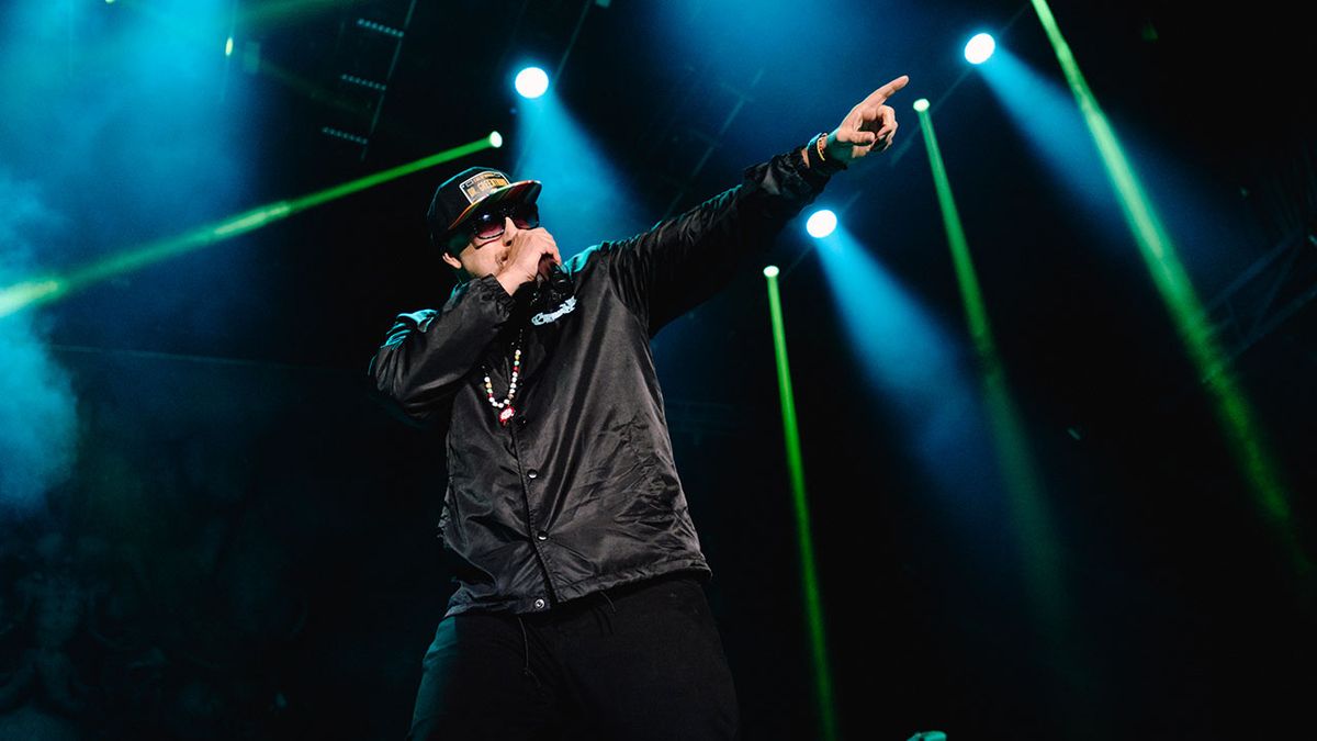 A photograph of Cypress Hill on stage at Aftershock